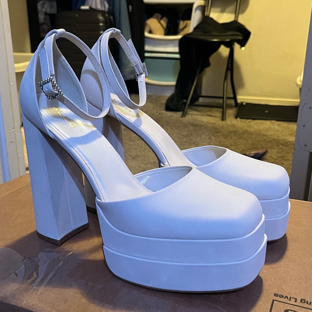 Aldo beige platform pumps
